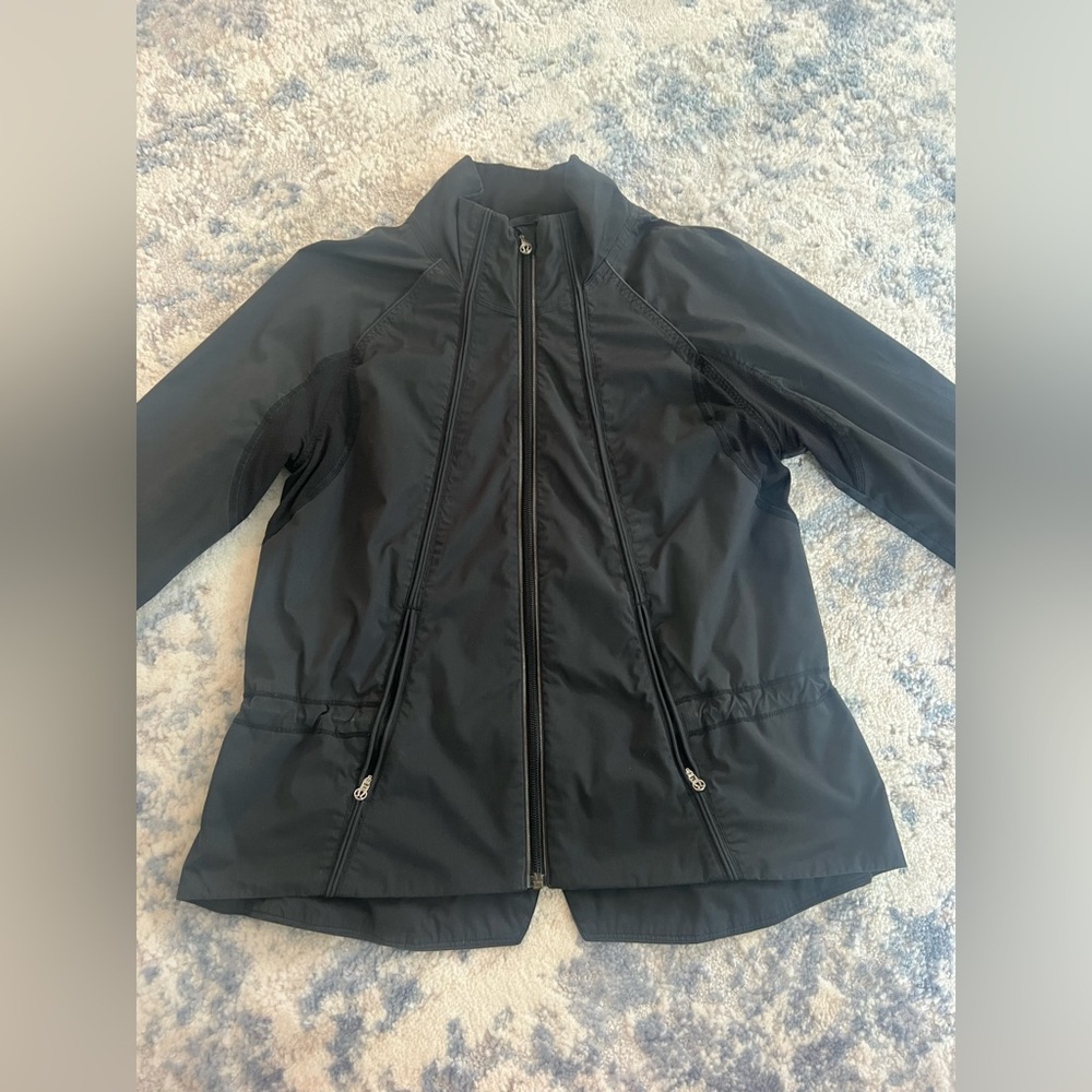 Size 4-6 LULU LEMON jacket. old style. Used. Good condition. price Negotiable